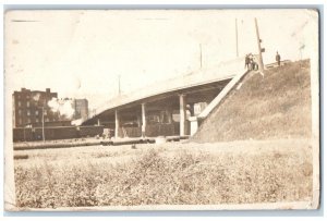 1912 Railroad Tracks Yard Road Underpass Pipes Utica NY RPPC Photo Postcard 