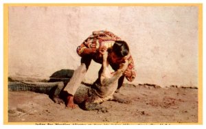 Indian boy wrestling Alligator, Musa Indian Village Miami Florida