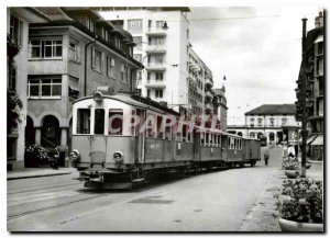 Postcard Modern convoy in the streets of Zug. At the bottom front of the tram...