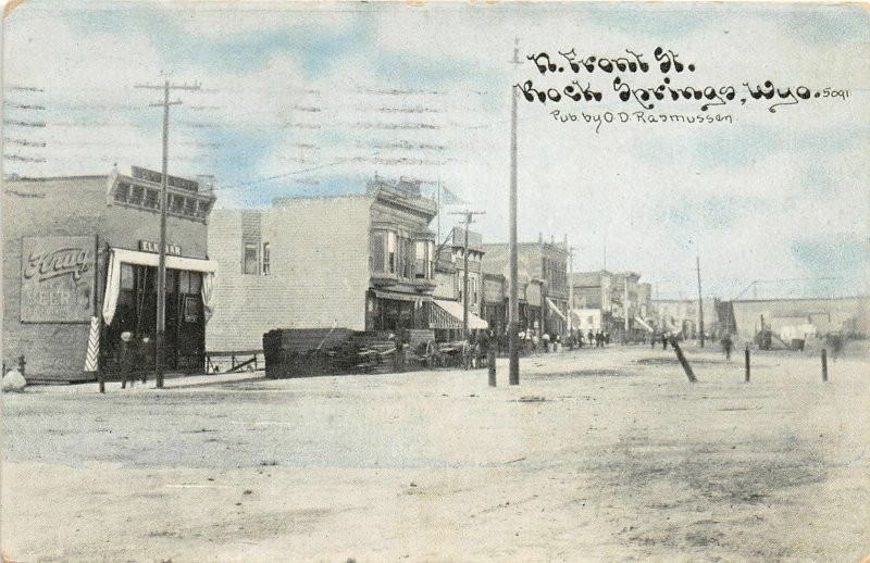 H9/ Rock Springs Wyoming Postcard 1909 Front St Stores Rasmussen