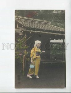 472902 Japan geisha girl with a teapot and a cake Vintage tinted postcard