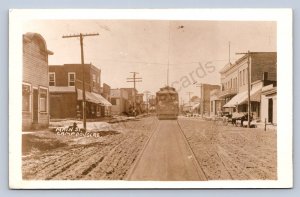 J90/ Camp Douglas Wisconsin RPPC Postcard c1910 Stores Trolley 232