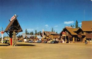 West Yellowstone Montana Cabin Street View Texaco Vintage Postcard K22795