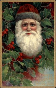 Christmas Santa Claus Holly Gilt Embossed c1900s-20s Postcard