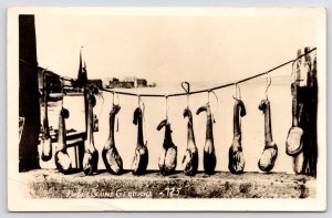 Seattle-Puget Sound~Giant Saltwater Clams~Strung Up Geoducks~RPPC 1940s Postcard