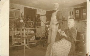 Older Man & Woman in Home Working Spinning Wheel c1910 Amateur RPPC