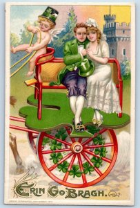 c1910's St. Patrick's Day Couple Cupid Riding Carriage John Winsch Postcard