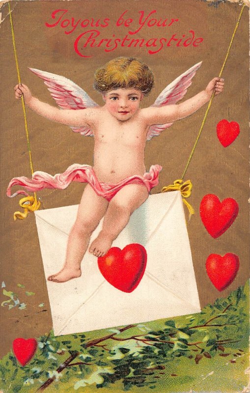 L483 Christmas Greetings 1909 Cupid love hearts vintage postcard