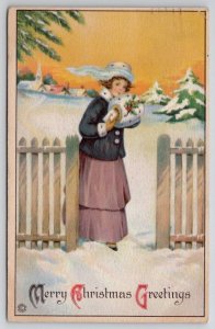 Christmas Greetings Woman In Snow With Gift Postcard U26