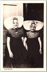 VINTAGE POSTCARD BIG-EYED SMILING YOUNG GIRLS FROM ZEELAND HOLLAND c. 1920s