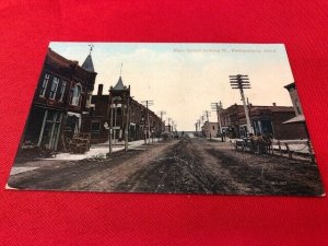 c1908? PARKERSBURG IA Main Street looking N, dirt road, horses, to Martha Voelz 