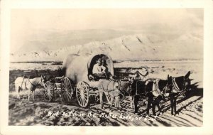 RPPC Mother Lode or Bust Covered Wagon Western Photo 1930s Vintage Postcard