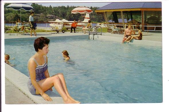 Outdoor Pool, Killarney Mountain Lodge, Ontario Woman Sun Bathing