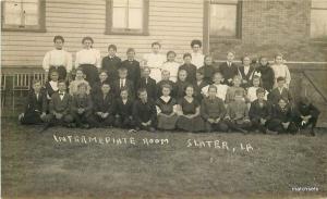 C-1910 SLATER IOWA School Group Photo Intermediate Room RPPC postcard 1034