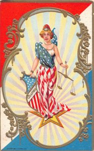 US Patriotic Lady Dressed in Flag Columbia Scale embossed postcard B985