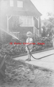 Germany, Berlin-Charlottenburg, RPPC, Young Girl Watering the Garden