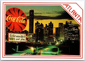 VINTAGE CONTINENTAL SIZE POSTCARD THE COKE SIGN AND MUSEUM AT ATLANTA GEORGIA