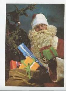 429418 ESTONIA New Year SANTA with gifts 1994 year RPPC Kuma advertising label