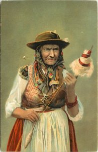 Rotograph Postcard German Ethnic Type Woman Holding a bobbin and Little Hat