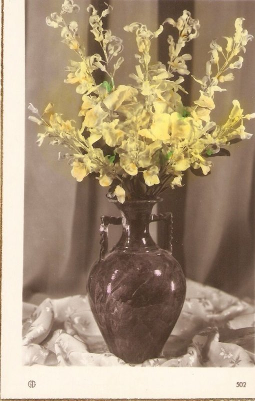 Beautiful bouquet of flowers in a vase Old vintage photo   postcard