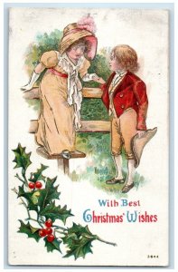 c1910's Christmas Children Fence Holly Berries Embossed Posted Antique Postcard