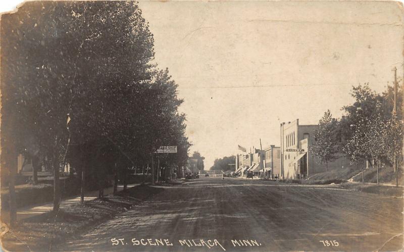 F36/ Milaca Minnesota RPPC Postcard 1919 Street Scene Stores 