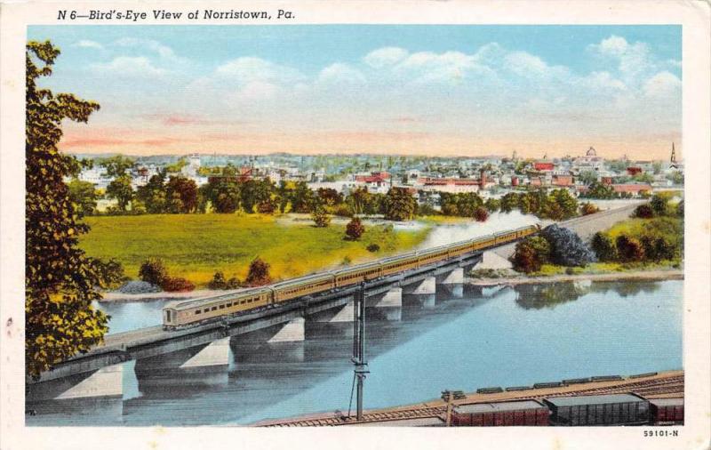 Aerial View of Norristown Pennsylvania  with  train on bridge over river