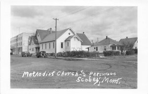 H18/ Scobey Montana RPPC Postcard c50s Methodist Church and Parsonage