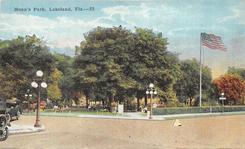 Lakeland Florida~Munn's Park~People Sitting under Trees~Sidewalk Sign~Flag~c1910