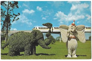 Dumbo and Topiary Elephant in Walt Disney World Florida Monorail in Background