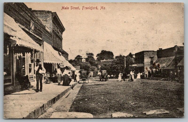 Frankford Missouri~Man Carries White Package on Main Street~Stores~Ladies~1908 