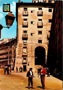 CONTINENTAL SIZE POSTCARD TRADITIONAL DRESS AT CUCHILLEROS ARCH MADRID SPAIN