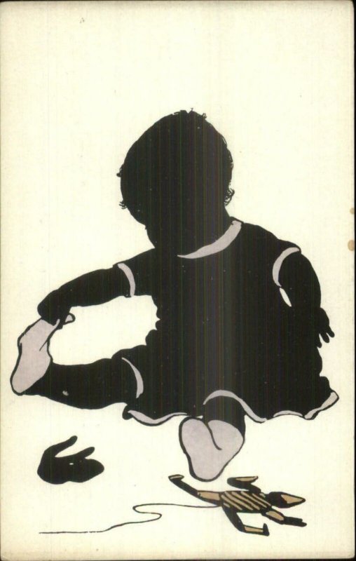 Silhouette - Baby Pulling Socks Off - Toys c1910 Postcard 