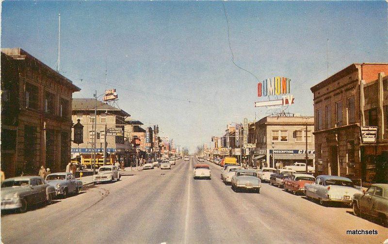 1950s TWIN FALLS IDAHO Main Street Otto News postcard cars 2565