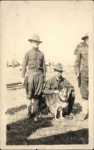 Collie Dog US Military  Soldiers Hand on Sidearm Gun c1910 Real Photo Postcard