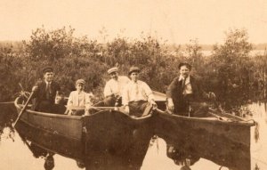 RPPC Real Photo Postcard - Men and Boys in Rowboats Drinking Alcohol