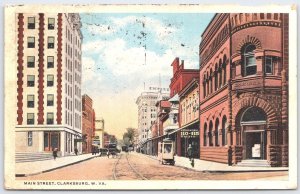 Clarksburg WV Main Street 1917 Postcard Trolley Cars Hudbaums Clothing