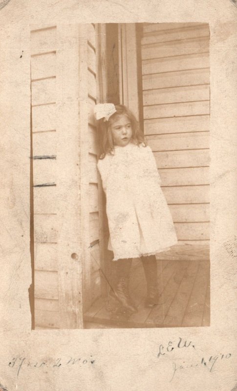 Vintage Postcard 1910's Beautiful Little Girl in Dress & Boots with Ribbon RPPC