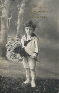 Children scenes & portraits postcard Switzerland navy suit flower bouquet forest