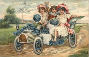 BEST WISHES FANTASY Children in Classic Flower Car EMBOSSED c1910 Postcard