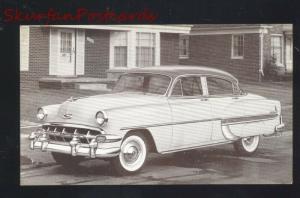 1954 CHEVROLET BEL AIR CHEVY 4 DOOR VINTAGE CAR DEALER ADVERTISING POSTCARD