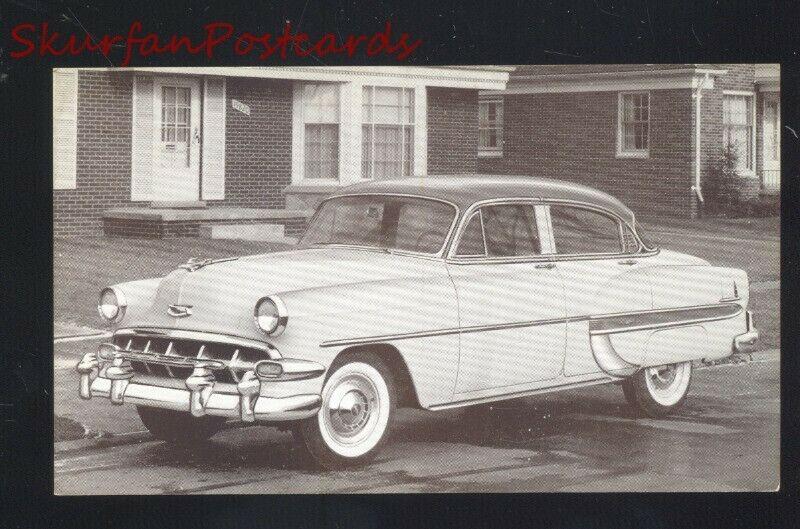 1954 CHEVROLET BEL AIR CHEVY 4 DOOR VINTAGE CAR DEALER ADVERTISING POSTCARD