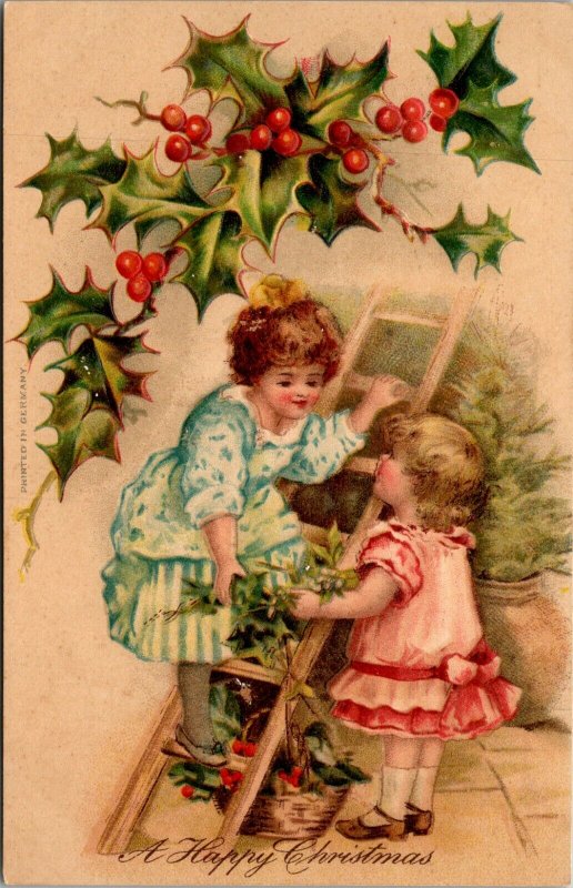 A Merry Christmas - KIDS CHILDREN Ladder Holly Missletoe - POSTCARD PC POSTED