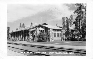 J33/ West Yellowstone Montana RPPC Postcard c1950s UP Railroad Dining 223