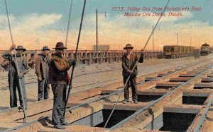 Poling Ore from Pockets into Boat Missabe Ore Docks Duluth Minnesota postcard