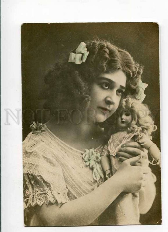 3031537 Young Lady w/ DOLL. Vintage Real Photo PC