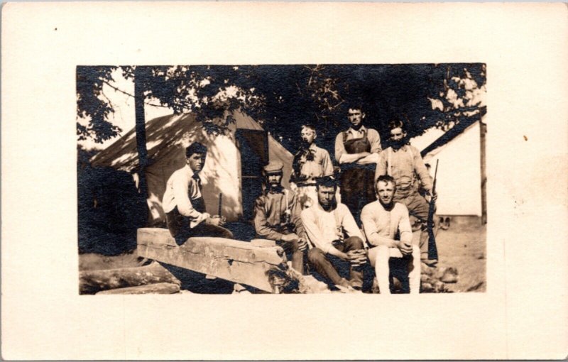 Real Photo Postcard Men with Rifles at Hunting Camp