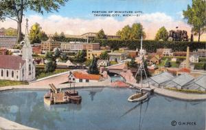 TRAVERSE CITY MICHIGAN~MINATURE CITY-HARBOR-BOATS-CHURCH-O W PECK POSTCARD