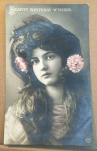 VINT .01 1912 USED EAS POSTCARD - IMAGE OF A YOUNG WOMAN, HEARTY BIRTHDAY WISHES