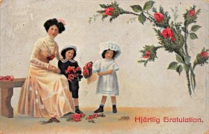 HJÄRTELIG GRATULATION~YOUNG WOMAN & CHILDREN~1914 SWEDEN SWEDISH POSTCARD